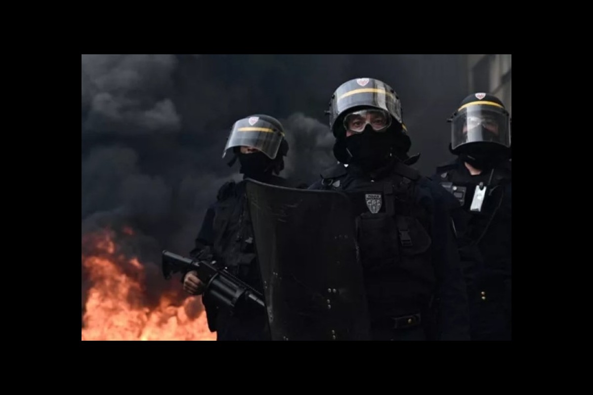 French prosecutor condemns police brutality as protester fights for his life