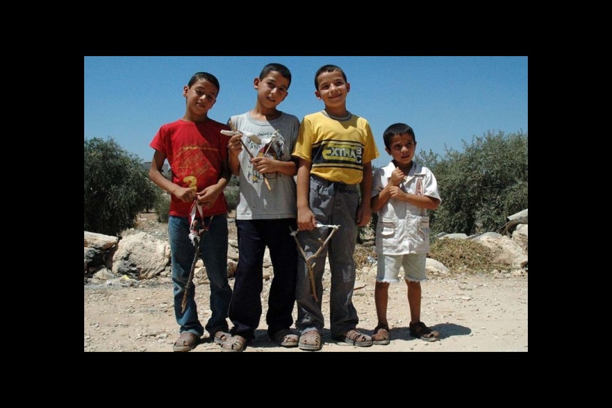 Palestinian children live in the rubble of Gaza
