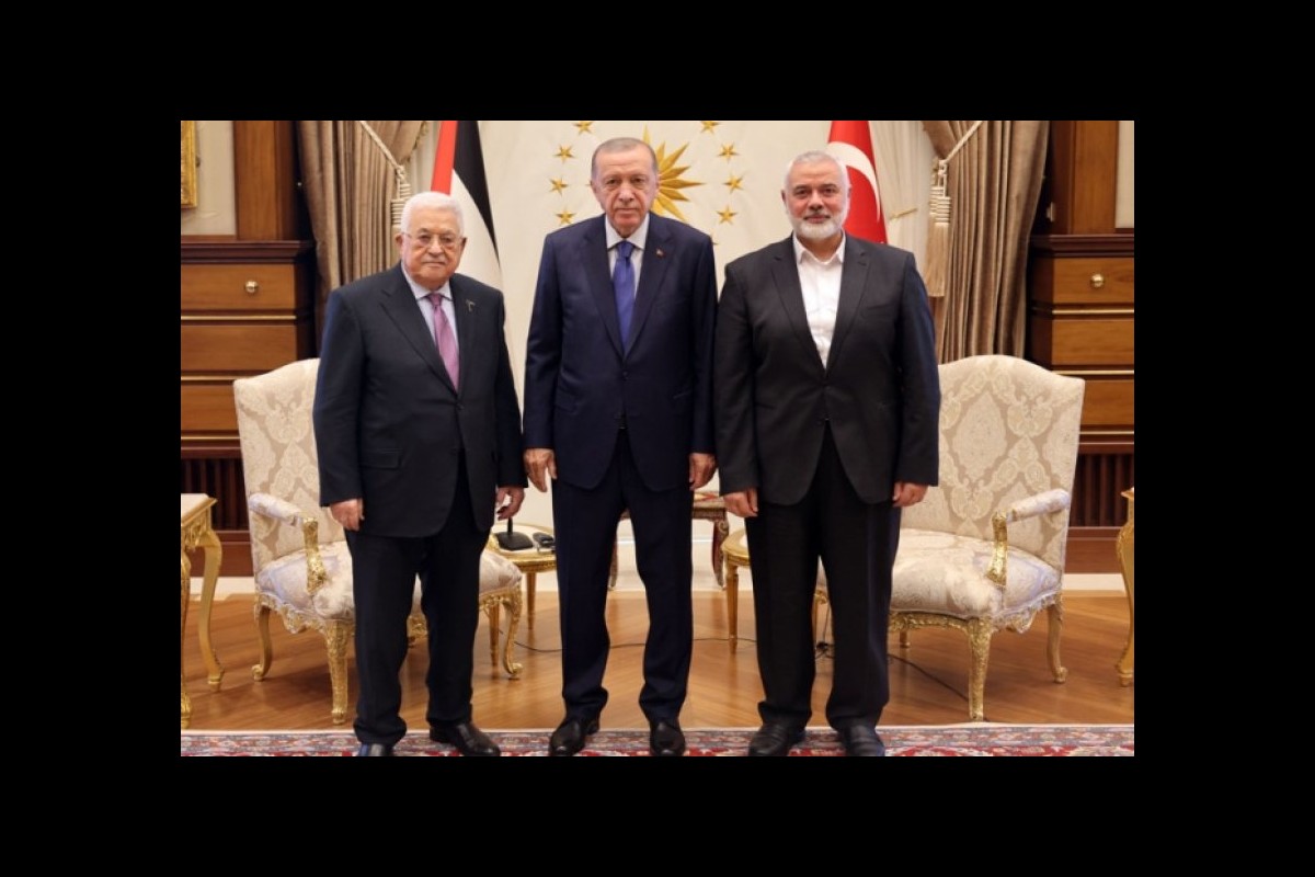 Erdogan meets with Palestinian leaders Abbas and Haniyeh to talk.