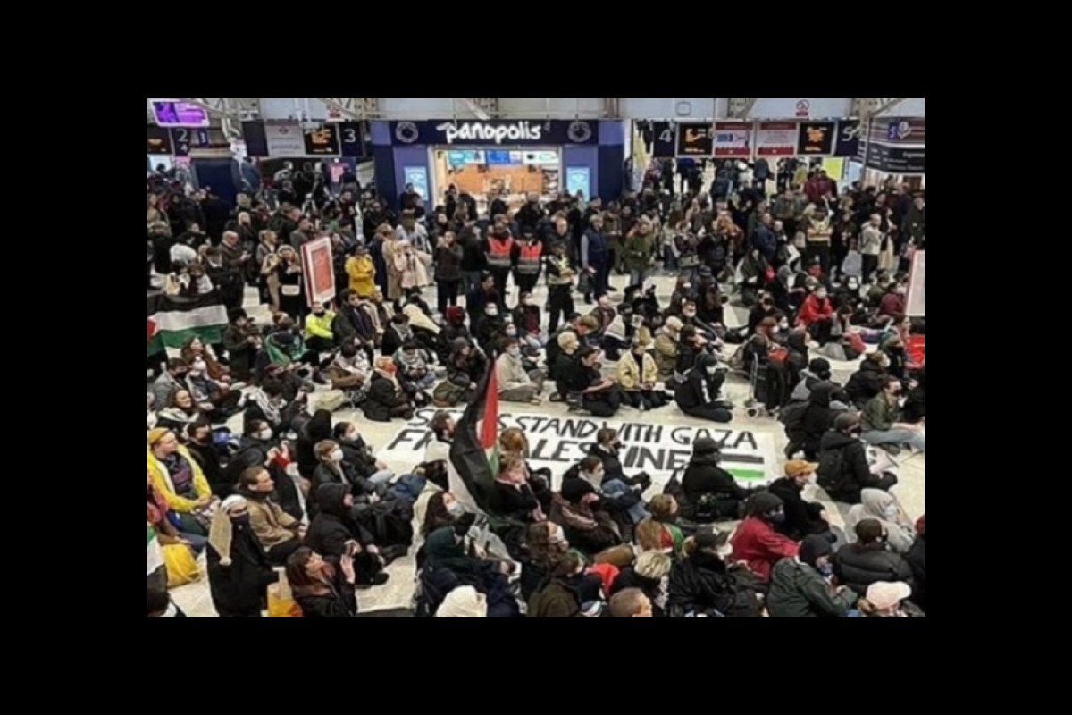 Supporters of a Palestinian sit-in at a London station