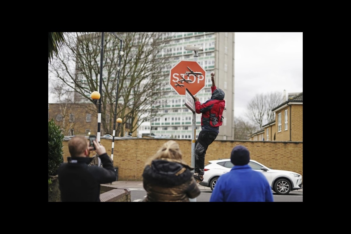 "Second Suspect Arrested in Theft of Banksy's Drone-adorned Stop Sign Artwork"