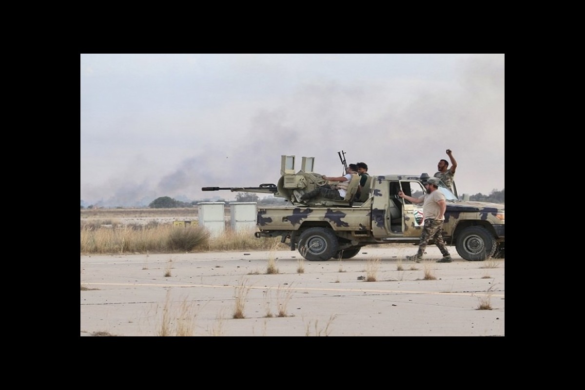 Libyan government: Militants to leave Tripoli after an agreement was reached