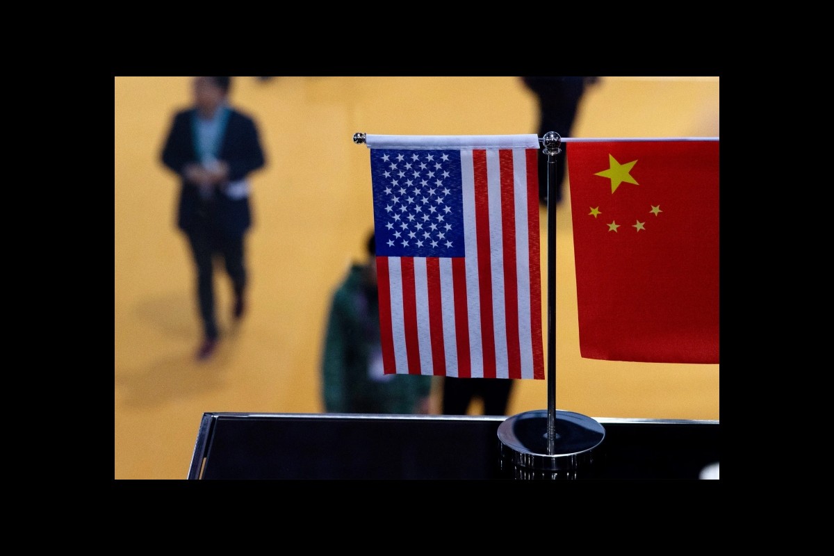 A top White House official says US and China are working to avoid conflict at talks in Beijing