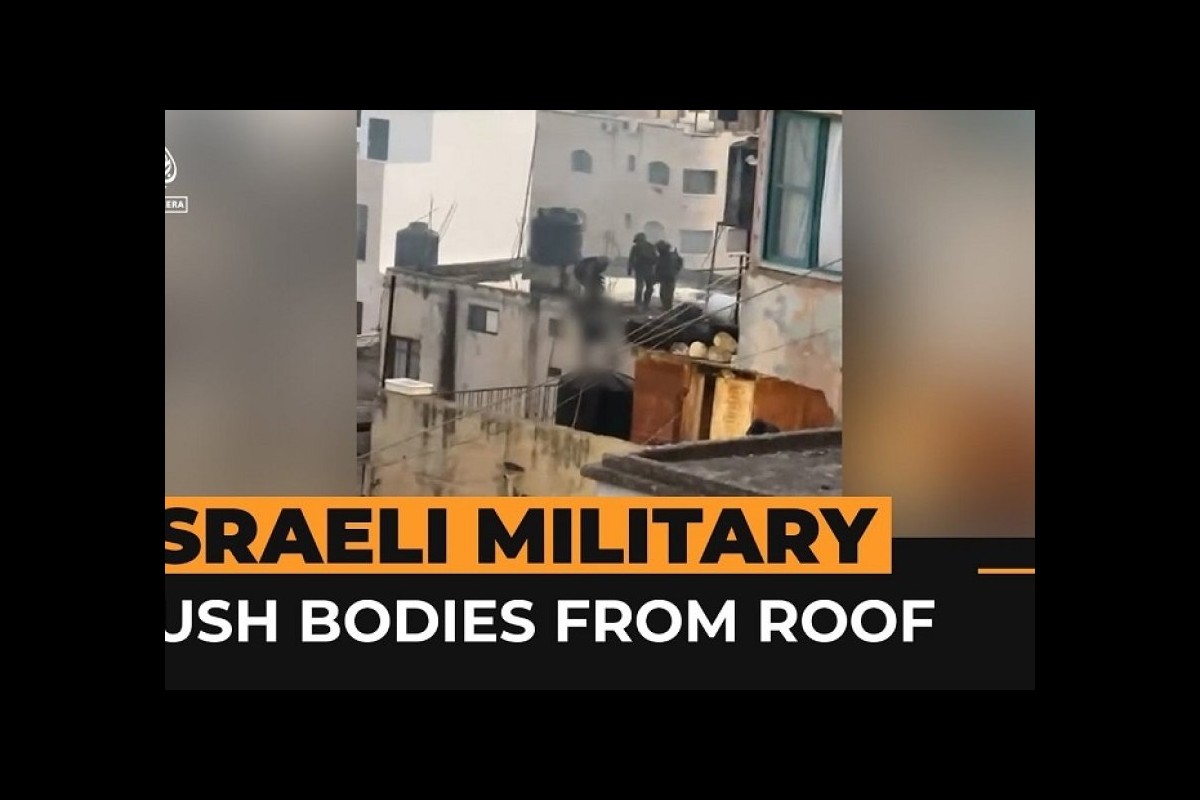 Israeli soldiers kicked dead bodies of Palestinians from the roof of the building