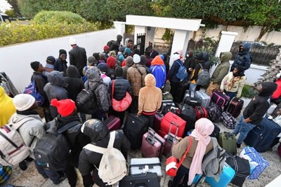 Group of migrants protest in Tunis in front of the IOM headquarters