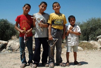 Palestinian children live in the rubble of Gaza