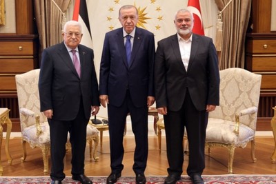 Erdogan meets with Palestinian leaders Abbas and Haniyeh to talk.