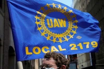 A mass strike of auto workers began in the United States