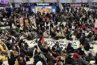 Supporters of a Palestinian sit-in at a London station