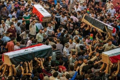 غضب عارم ضد امريكا خلال تشييع شهداء الحشد الشعبي
