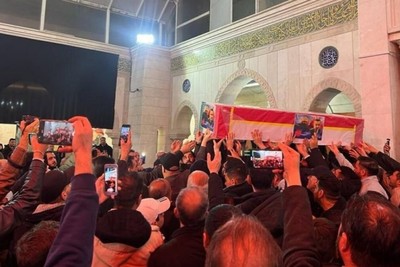Burial of the martyr Mousavi in ​​the temple of Her Ladyship Ruqaiya