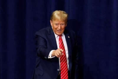 Trump Sparks Outrage with Video Depicting Hog-Tied Biden Image