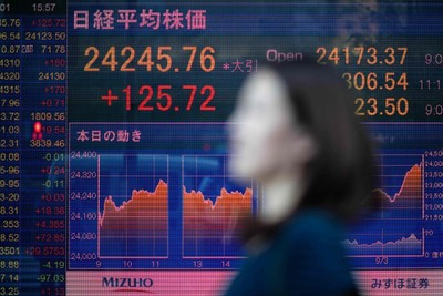 Japan's Nikkei is fighting its way into positive territory - the yen and Wall Street are weighing on it
