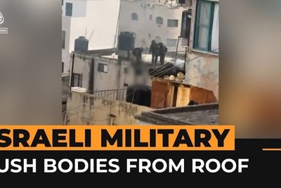 Israeli soldiers kicked dead bodies of Palestinians from the roof of the building