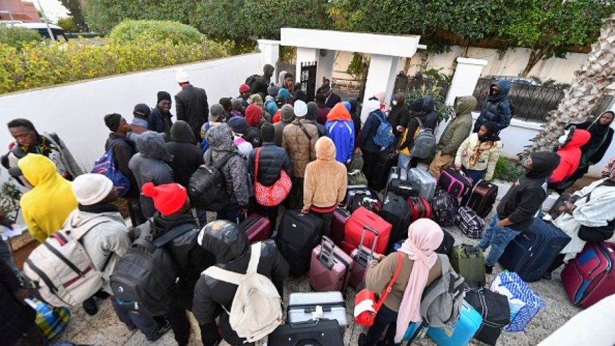 Group of migrants protest in Tunis in front of the IOM headquarters