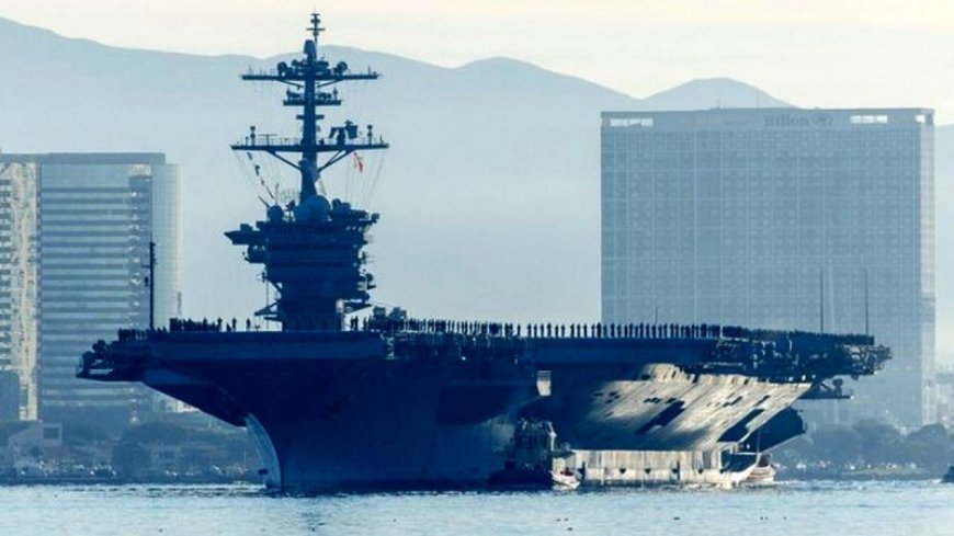 Deployment of a Chinese aircraft carrier at the same time as American movements in the region