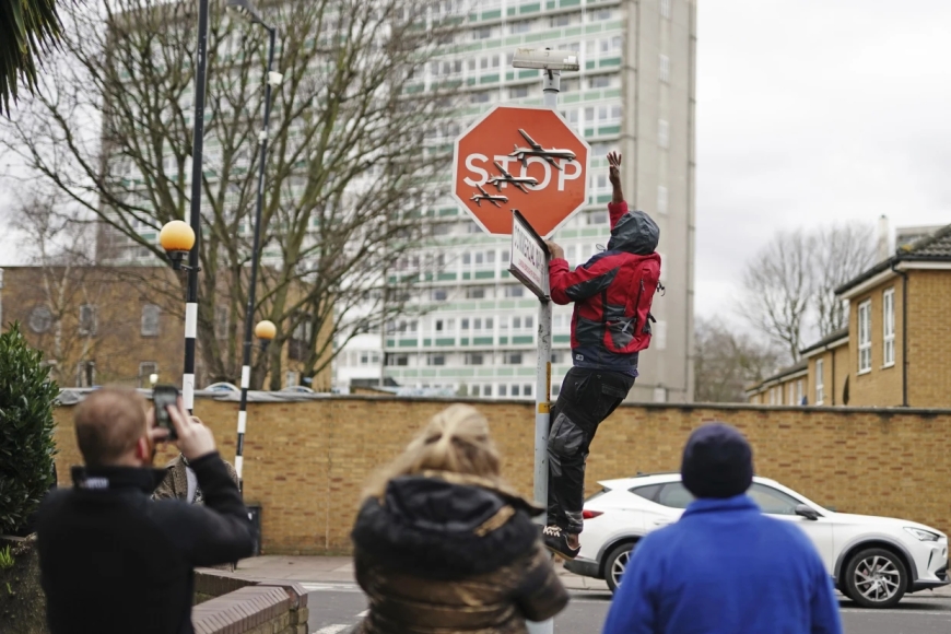 "Second Suspect Arrested in Theft of Banksy's Drone-adorned Stop Sign Artwork"