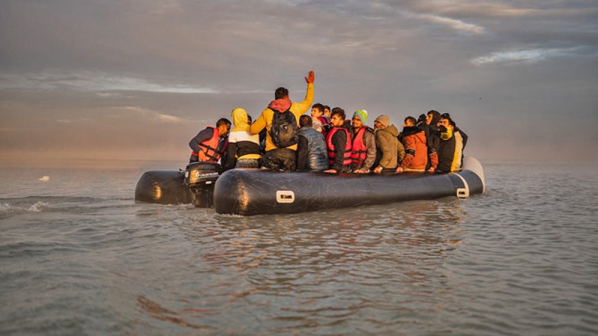 A boat with 50 migrants sinks in waters off northern France and some are in critical condition