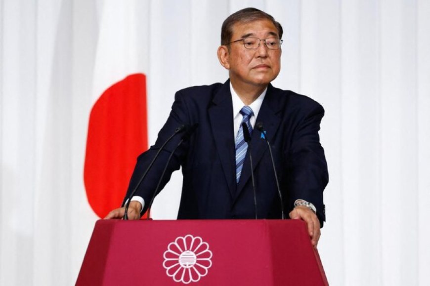 Japan’s PM Pledges to Stay After Election Setback